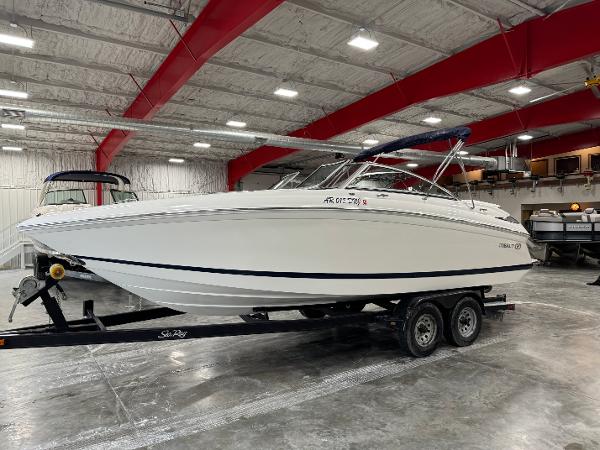 Cobalt 242 2011 Cobalt 242 boat on trailer in indoor storage facility.