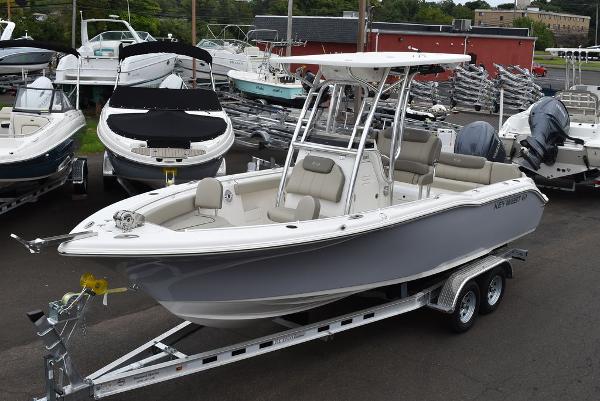 Key West 239 FS 2025 Key West 239 FS boat on trailer in marina lot.