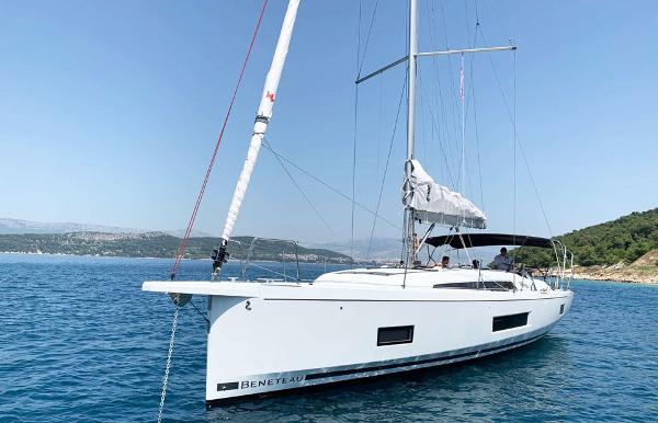 Beneteau Oceanis 46.1 2019 Beneteau Oceanis 46.1 sailboat on calm blue water, clear sky background.
