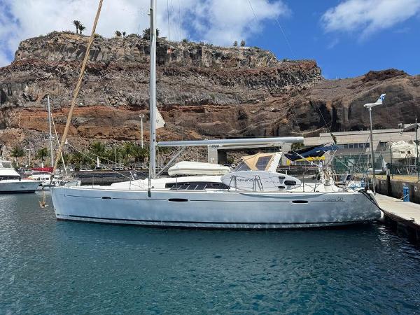 Beneteau Oceanis 50 Family Sailboat Beneteau Oceanis 50 Family 2010 docked in a scenic marina with rocky cliffs.