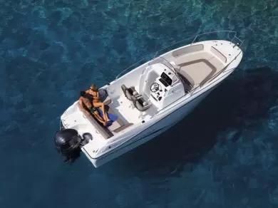 Jeanneau CAP CAMARAT 7.5CC S2 2015 Jeanneau CAP CAMARAT 7.5CC S2 boat on clear blue water.