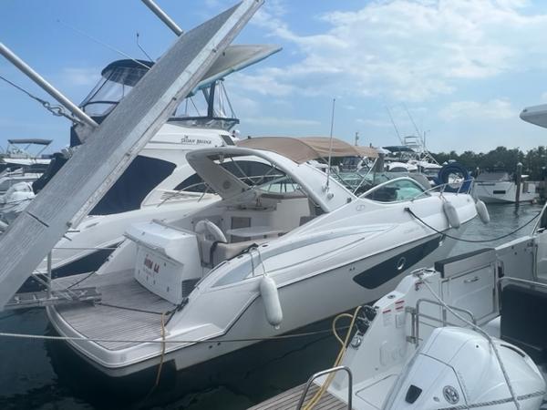 Schaefer 365 2018 Schaefer 365 yacht docked at a marina under a partly cloudy sky.