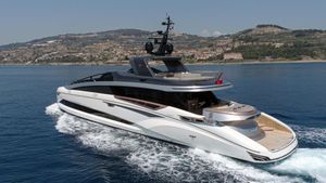 Tecnomar Evo 120 Luxury Tecnomar Evo 120 yacht cruising near scenic coastline, 2022 model.