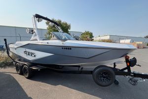 Axis T220 2025 Axis T220 boat on trailer, sleek design, parked outdoors.