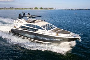 Pearl 80 Luxurious 2020 Pearl 80 yacht cruising on open water, showcasing sleek design and elegance.