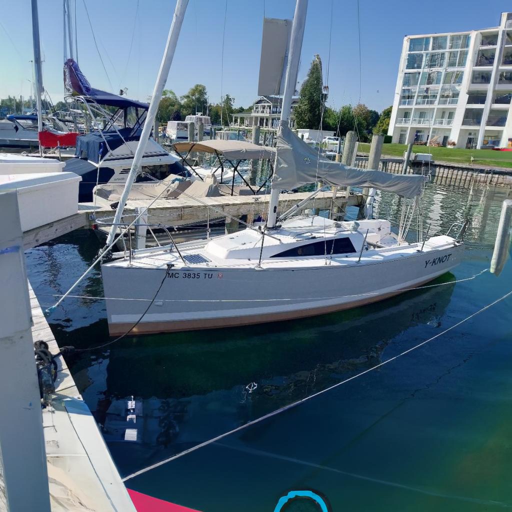 Catalina 275 Sport 2014 Catalina 275 Sport sailboat docked in a marina, surrounded by other boats.