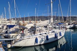 Dufour 36 Classic Sailboat Dufour 36 Classic 2001 docked in a marina, surrounded by other boats.
