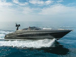 Riva 63 Virtus 2016 Riva 63 Virtus yacht cruising on open water under a clear sky.