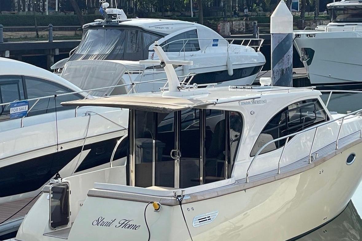 Erman Lobster 34 2024 Erman Lobster 34 yacht docked at marina, surrounded by other boats.
