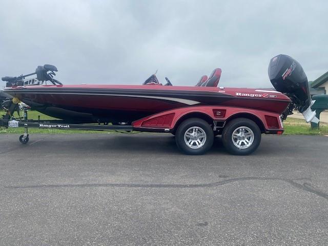 Ranger Z519R 2025 Ranger Z519R boat on trailer, red and black design, parked outdoors.
