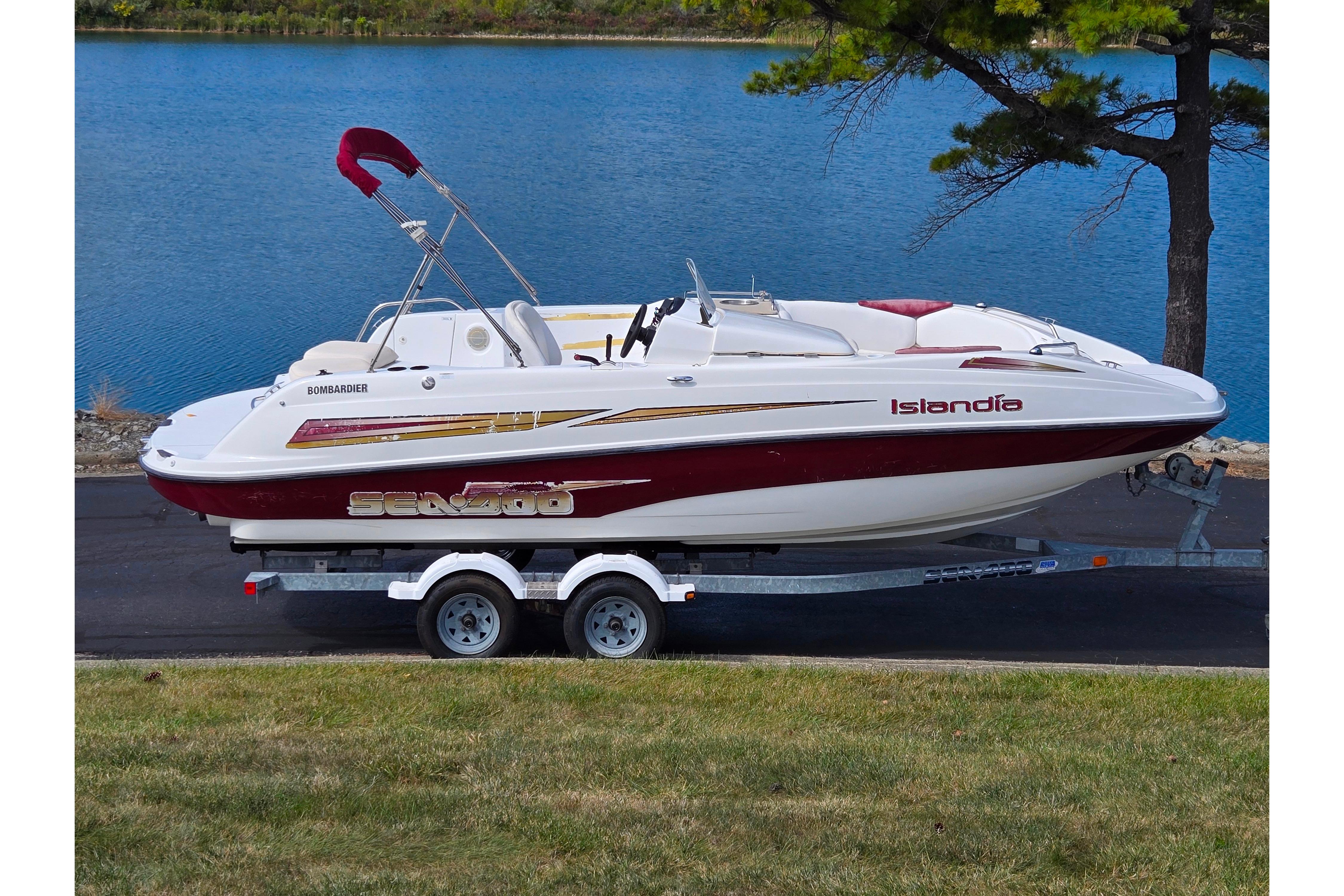 Sea-Doo Sport Boats Islandia 2004 Sea-Doo Islandia sport boat on trailer by a lake.