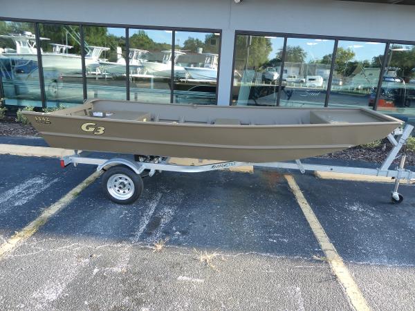 G3 1442 2024 G3 1442 boat on trailer outside dealership.
