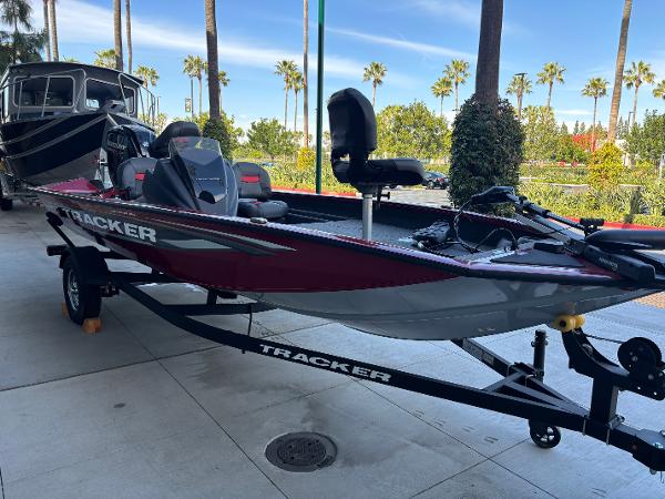 Tracker Pro Team 175 Crappie Edition 2025 Tracker Pro Team 175 Crappie Edition boat on trailer, parked outdoors.
