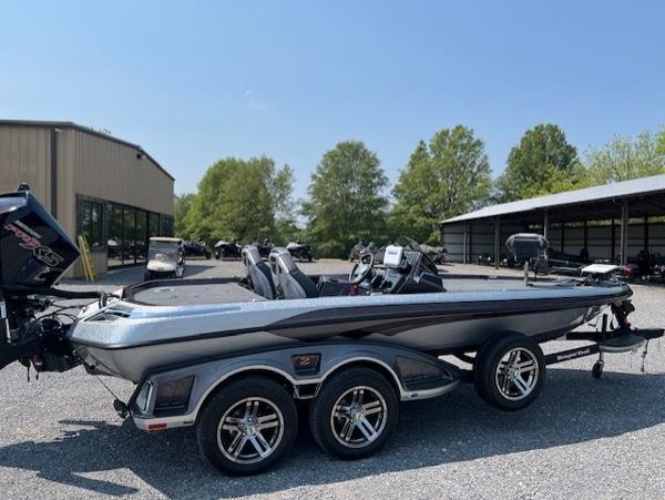 Ranger Z521 R 2024 Ranger Z521 R boat on trailer, parked outdoors under clear sky.