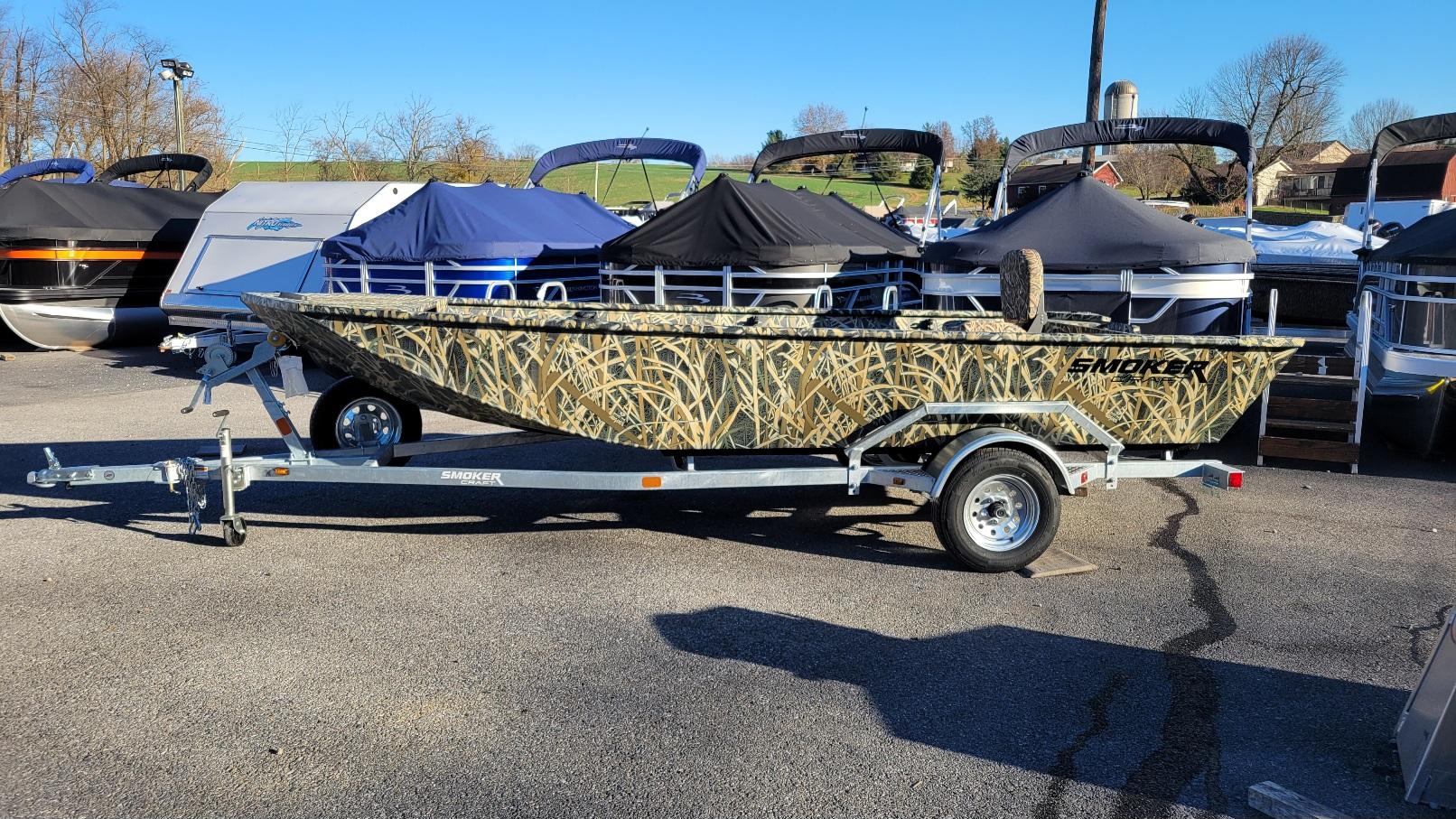 Smoker Craft Sportsman 1660 tiller. Mossy Oak Camo (In stock!) 2025 Smoker Craft Sportsman 1660 Tiller in Mossy Oak Camo on trailer.