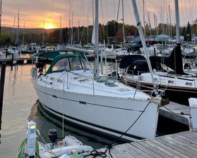 Beneteau Oceanis 393 Sailboat Beneteau Oceanis 393, 2004 model, docked at marina during sunset.