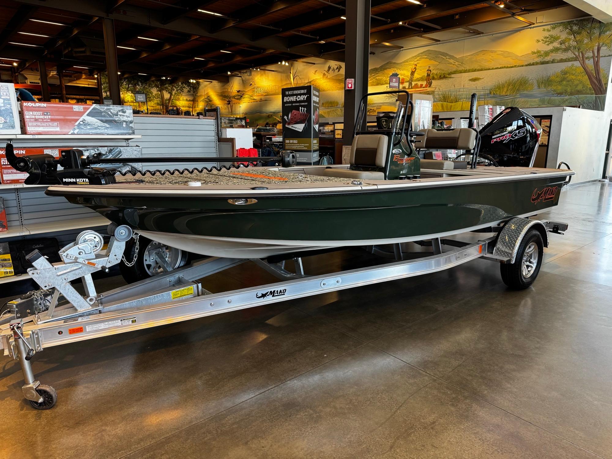 Mako 18 Pro Skiff Backwater Edition 2025 Mako 18 Pro Skiff Backwater Edition on display in a showroom.