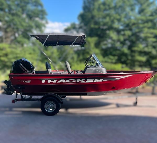 Tracker Pro Guide V-16 WT 2025 Tracker Pro Guide V-16 WT boat with canopy on trailer.