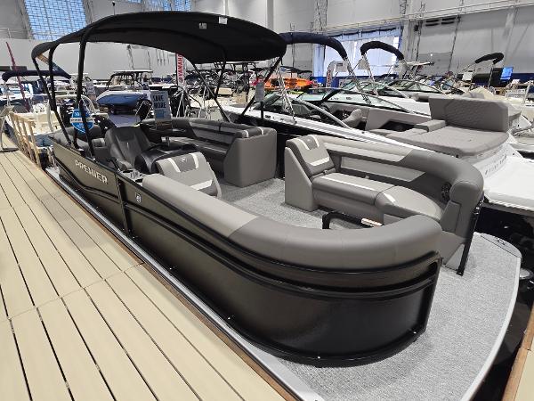 Premier 220 Sunscape RF XLC 2025 Premier 220 Sunscape RF XLC pontoon boat displayed at an indoor boat show.