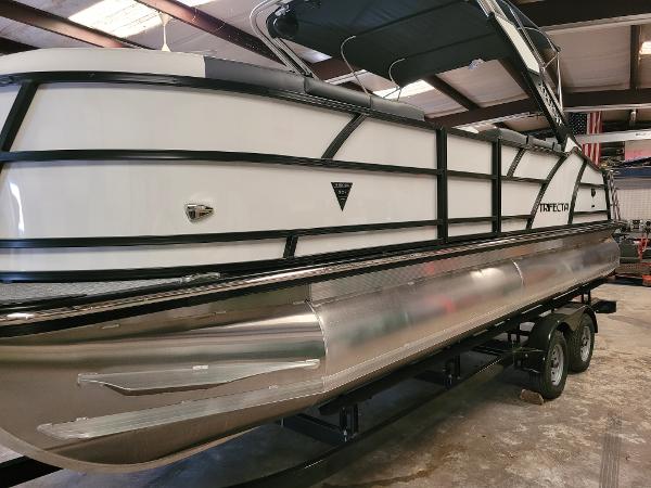 Trifecta 24' SB2 ARCH SS 3 Plus 2023 Trifecta 24' SB2 ARCH SS 3 Plus pontoon boat in a showroom.