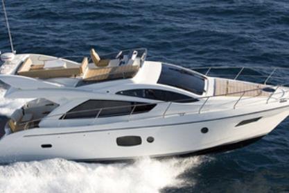 Astondoa 44 Fly Astondoa 44 Fly 1996 yacht cruising on open water, showcasing sleek design and luxury.