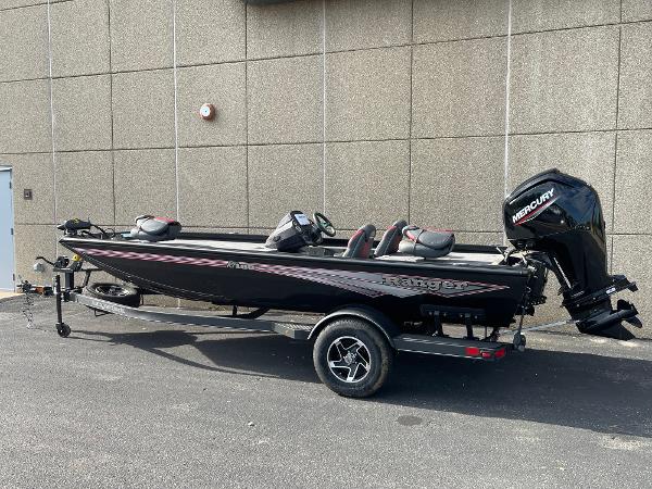 Ranger RT188 2024 Ranger RT188 boat with Mercury engine on trailer, parked outdoors.