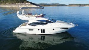Azimut 40 Flybridge 2013 Azimut 40 Flybridge yacht on calm water, scenic background.
