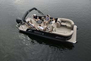 Starcraft EXS 3 Q DH 2026 Starcraft EXS 3 Q DH pontoon boat with passengers on calm water.