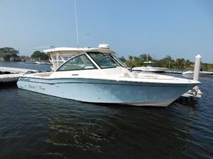 Grady-White Freedom 375 2018 Grady-White Freedom 375 boat docked on calm water.