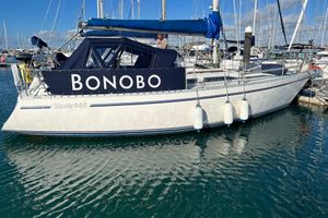 Moody 346 Sailboat "Bonobo" docked, Moody 346 model, 1989, in a marina with clear blue water.