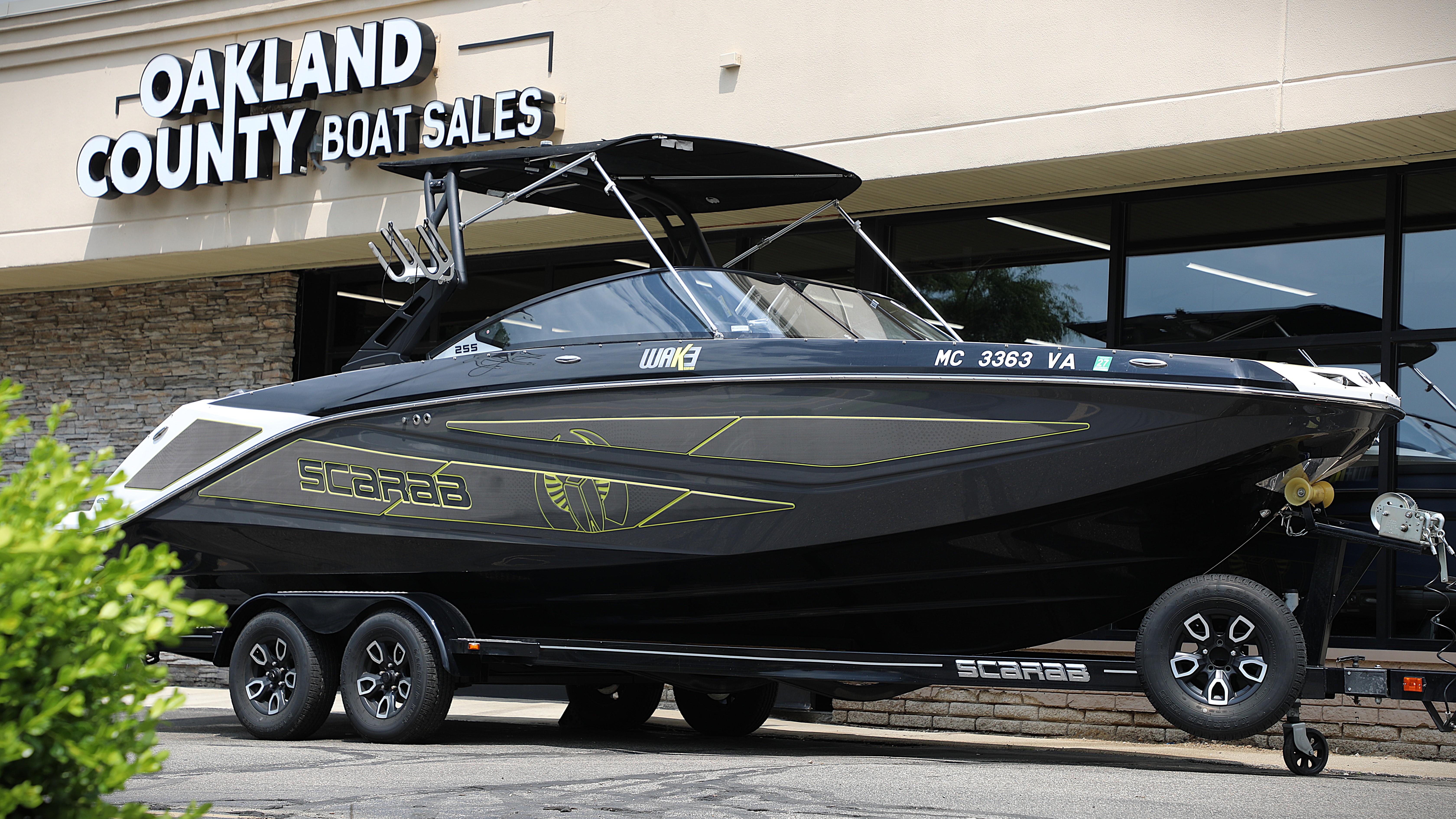 Scarab 255 ID 2023 Scarab 255 ID boat displayed at Oakland County Boat Sales.