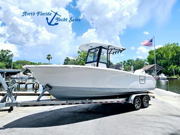 Sea Hunt Ultra 255 SE 2025 Sea Hunt Ultra 255 SE boat on trailer at North Florida Yacht Sales.