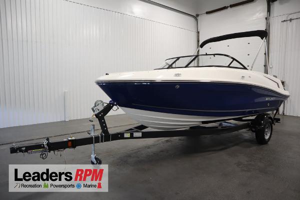 Bayliner VR5 Bowrider 2024 Bayliner VR5 Bowrider on trailer in showroom, Leaders RPM logo visible.