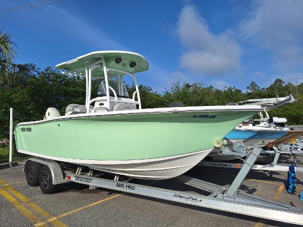 Sea Pro 219 Center Console 2020 Sea Pro 219 Center Console boat on trailer in parking lot.