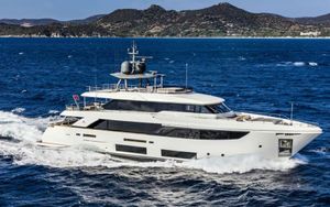 Custom Line Navetta 33 Luxurious 2024 Custom Line Navetta 33 yacht cruising on blue ocean waters.