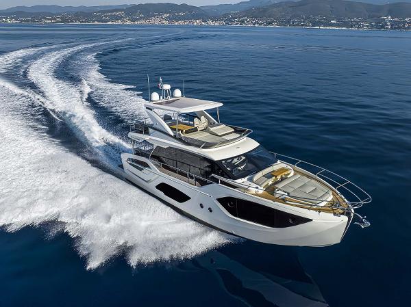 Absolute 52 FLY Luxurious 2026 Absolute 52 FLY yacht cruising on open water, showcasing sleek design and elegance.