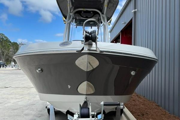 Finseeker 230 FS 2024 Crownline 230 FS boat front view at dock.