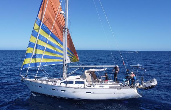 Southerly 135 Sailing yacht Northshore Southerly 135, 2005 model, with colorful sails on open sea.