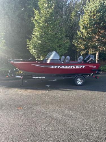 Tracker Pro Guide V-16 WT 2025 Tracker Pro Guide V-16 WT boat on trailer, parked outdoors.