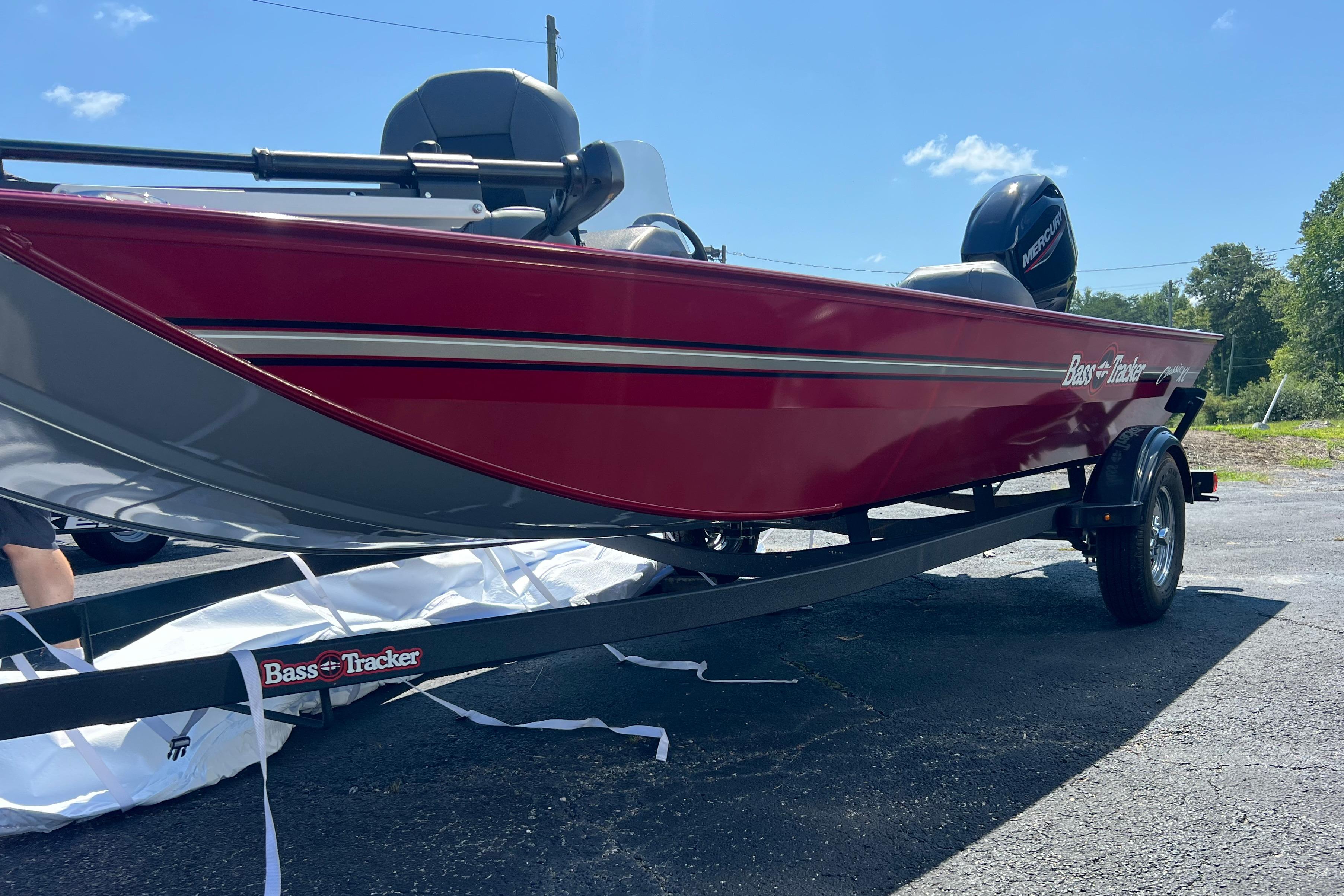Tracker Bass Tracker Classic XL 2026 Tracker Bass Tracker Classic XL boat on trailer, red exterior, sunny day.