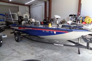 Bass Tracker PT175 2018 Bass Tracker PT175 boat in garage, blue and white, on trailer.