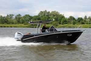 Custom Tecnoteam 4k7 Custom Tecnoteam 4k7 boat cruising on a river, powered by a Honda engine, 2024 model.