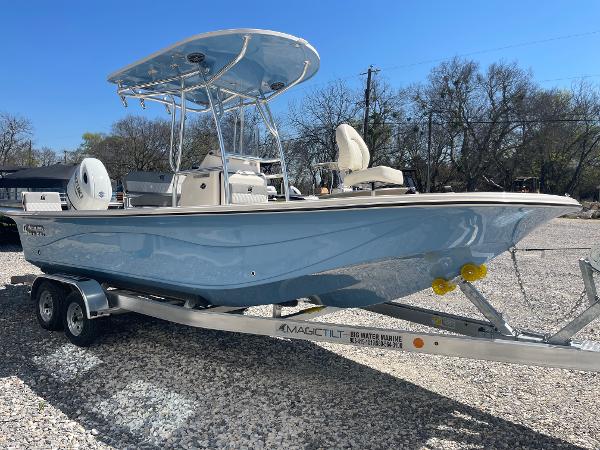 Carolina Skiff 23 LS 2024 Carolina Skiff 23 LS boat on a trailer, side view.