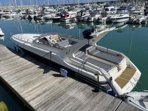 Sunseeker Apache 45 1994 Sunseeker Apache 45 yacht docked in a marina, surrounded by other boats.