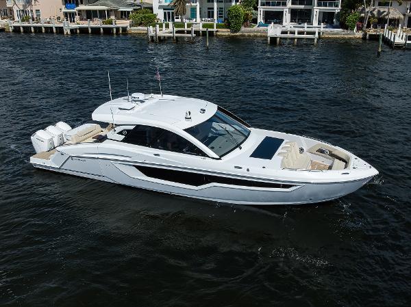 Cruisers Yachts 50 GLS Outboard 2024 Cruisers Yachts GLS-OB luxury boat on water, showcasing sleek design and modern features.