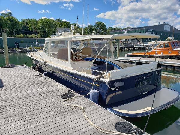 MJM 40z Downeast 2013 MJM 40z Downeast boat docked at a marina on a sunny day.