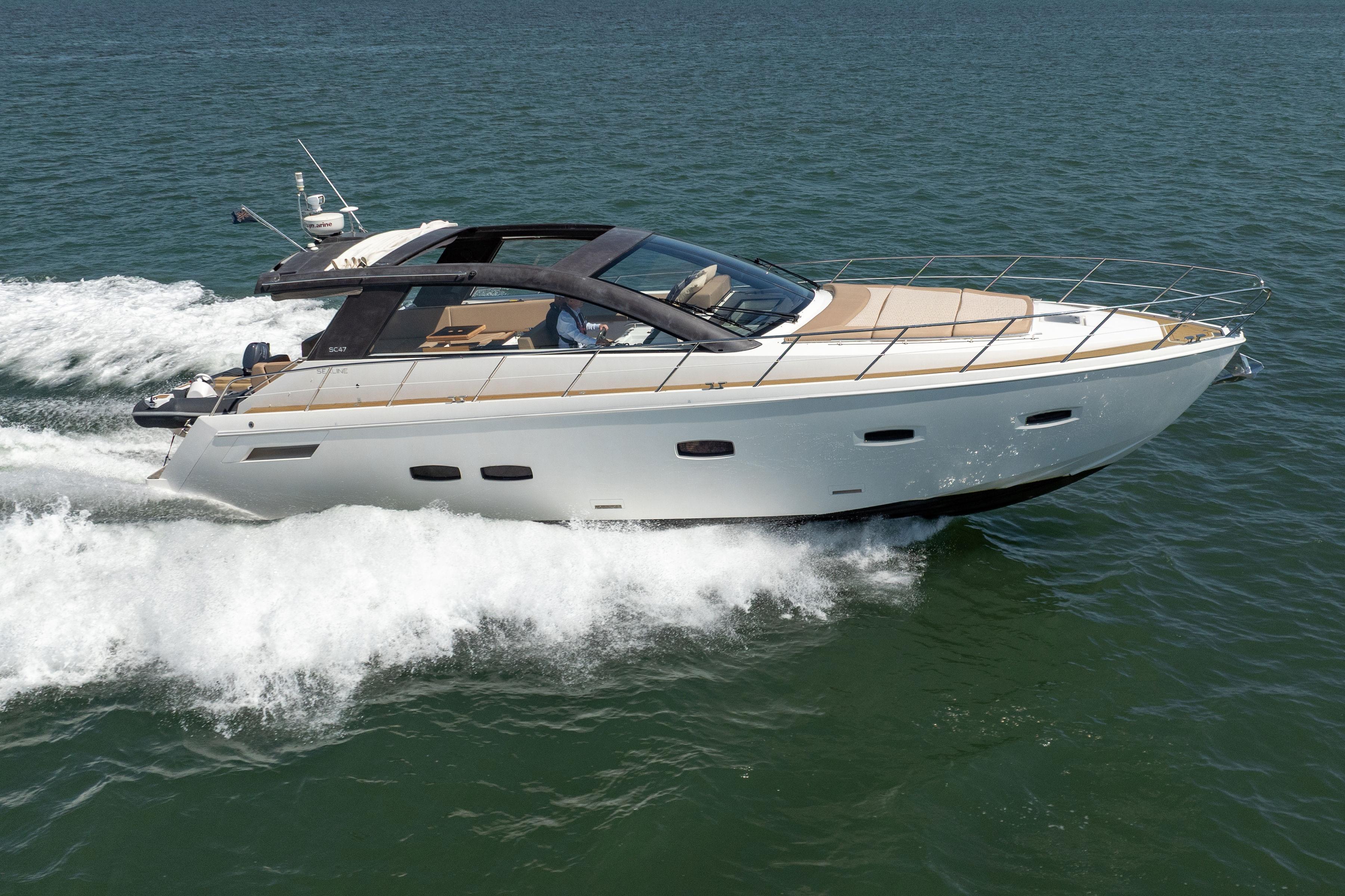 Sealine SC47 2010 Sealine SC47 yacht cruising on open water.