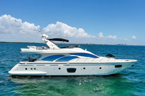 Azimut 75 2009 Azimut 75 yacht cruising on clear blue ocean waters.
