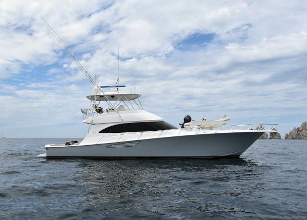 Viking 62 Convertible 2014 Viking 62 Convertible yacht on open water under cloudy sky.