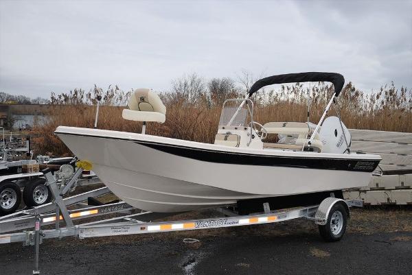 Carolina Skiff 192 JLS 2023 Carolina Skiff 192 JLS boat on trailer, parked outdoors.